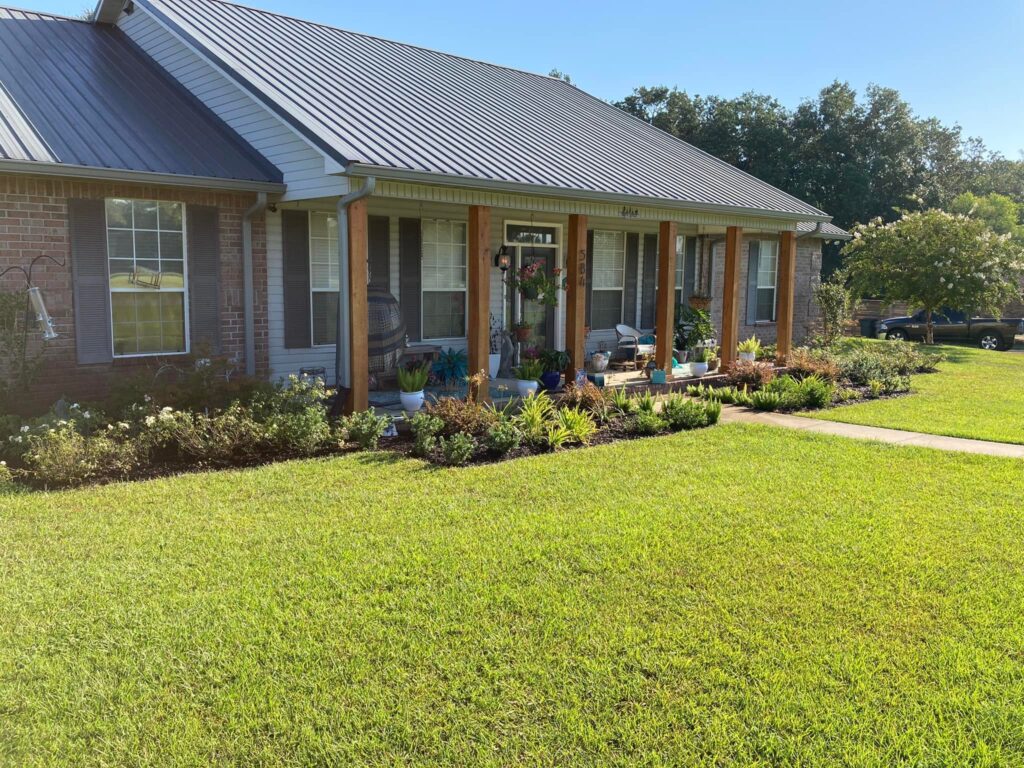 Well-maintained residential property with landscaping and exterior cleaning by Big Mess No Stress.